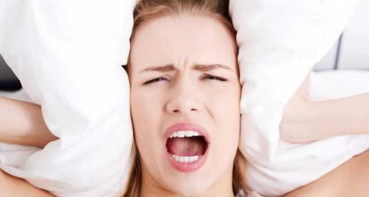 how to sleep with ear pain