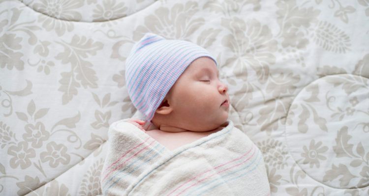 difference between receiving blanket and swaddle